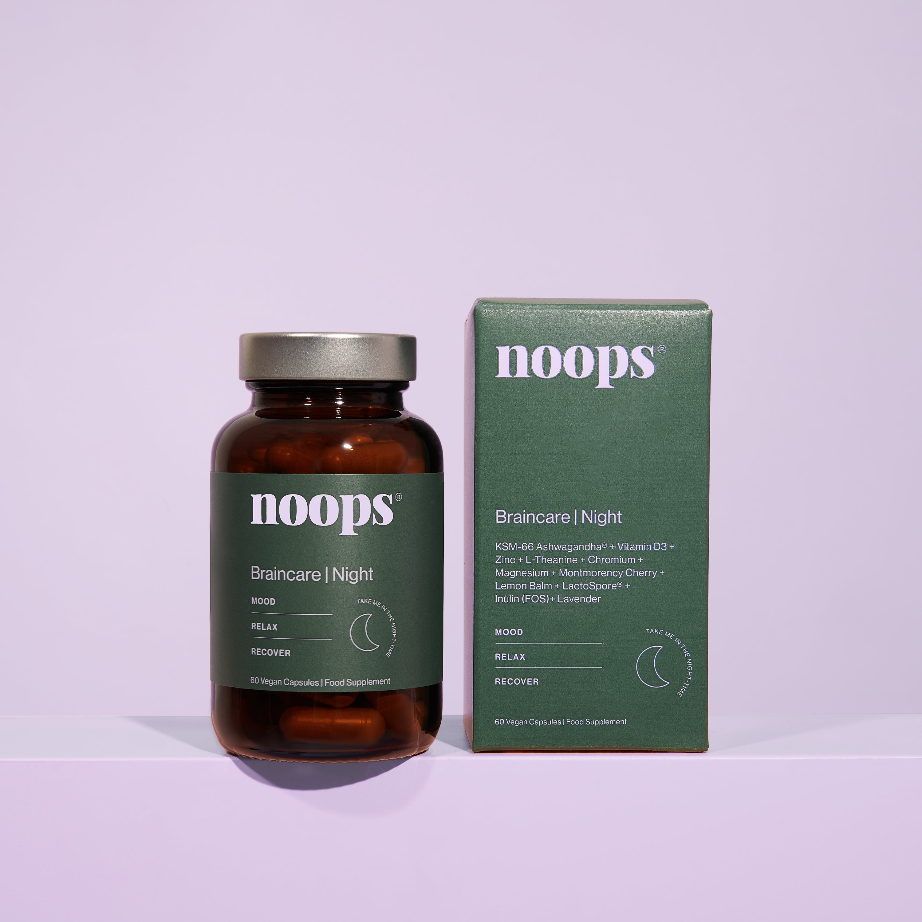 A bottle and box of noops nootropics Braincare Night supplements against a lilac background. Use this vegan and science backed formula to support anxiety, mood relief, sleep support and relaxation